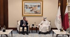 خالد عبدالغفار  مع وزير الصحة القطري د