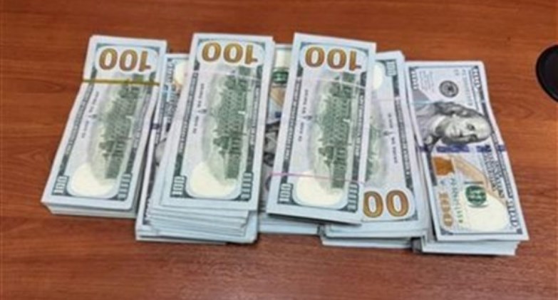 ضبط قضايا إتجار بالنقد الأجنبي 