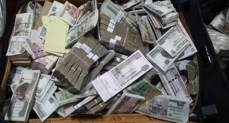 ضبط قضايا إتجار بالنقد الأجنبي
