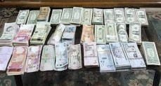 ضبط قضايا إتجار بالنقد الأجنبي