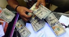 ضبط قضايا إتجار بالنقد الأجنبي